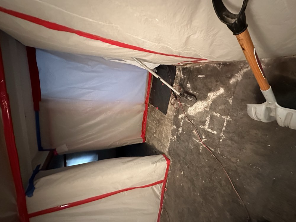 Mold containment barrier set up during remediation